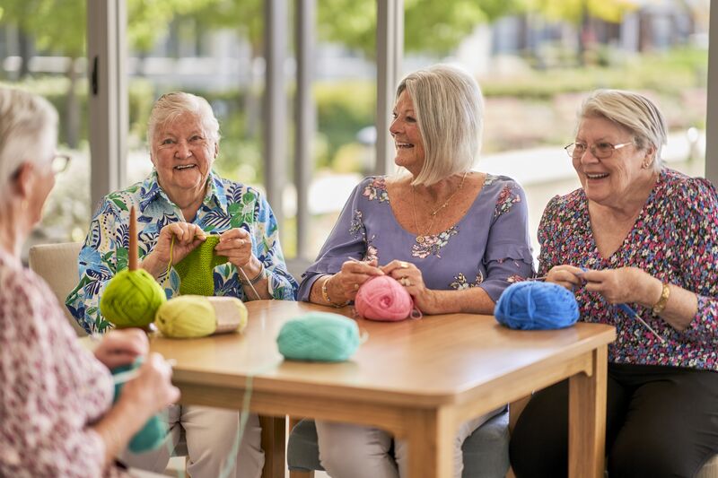 Residents of The Grove join a knitting group