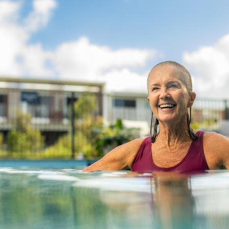 Woman swimming at Sunrise Beach Village