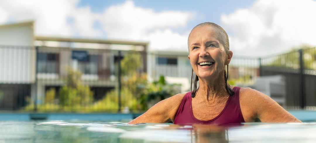 Woman swimming at Sunrise Beach Village