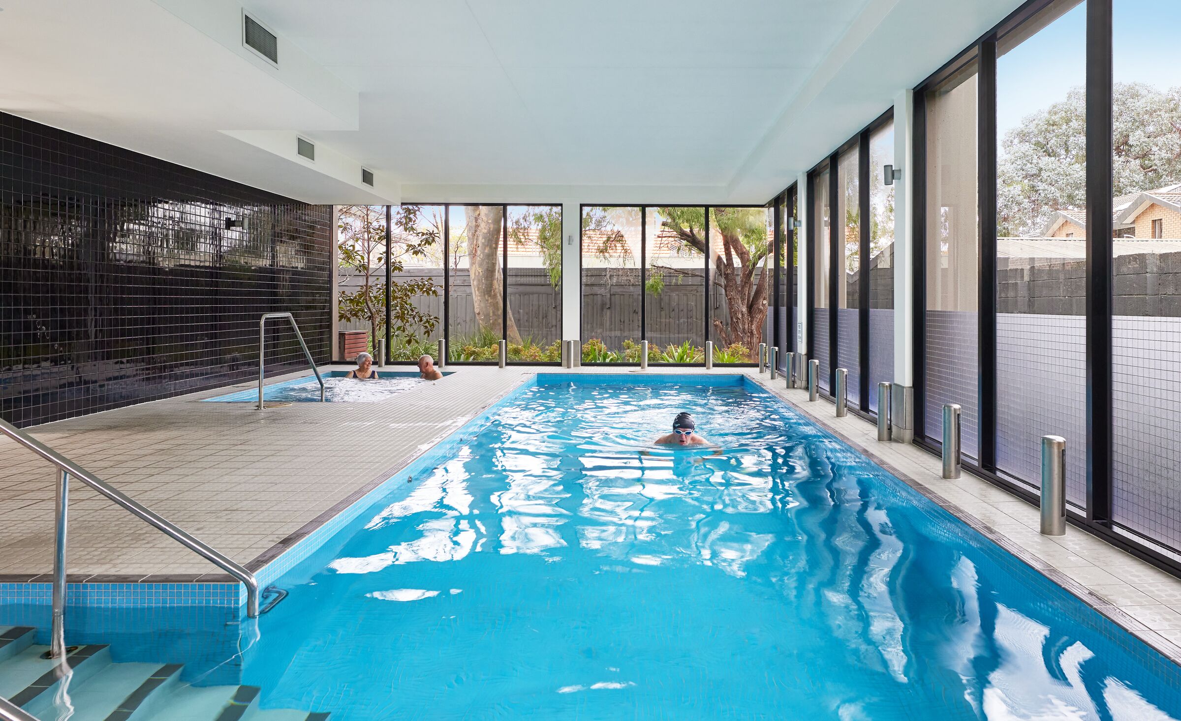 The Brighton on Bay good sized indoor swimming pool and spa in light and airy room