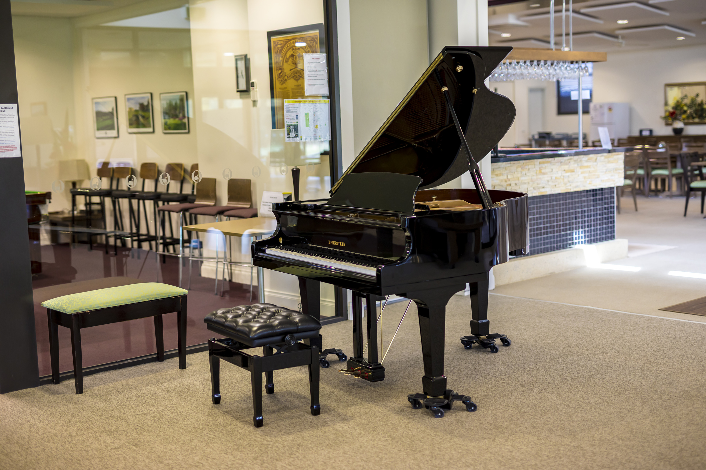Waterford Park piano near bar area