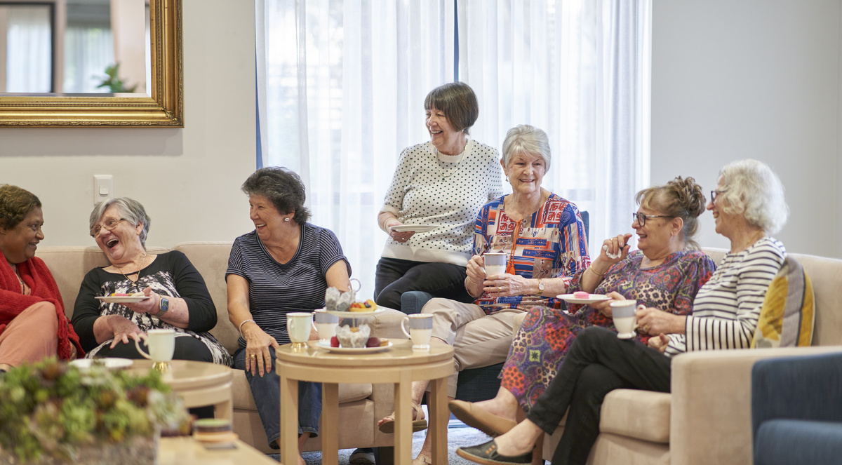 Residents of Nelsons Grove retirement village enjoying a social get together in the community centre