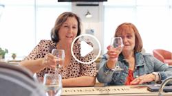 Two ladies drinking wine