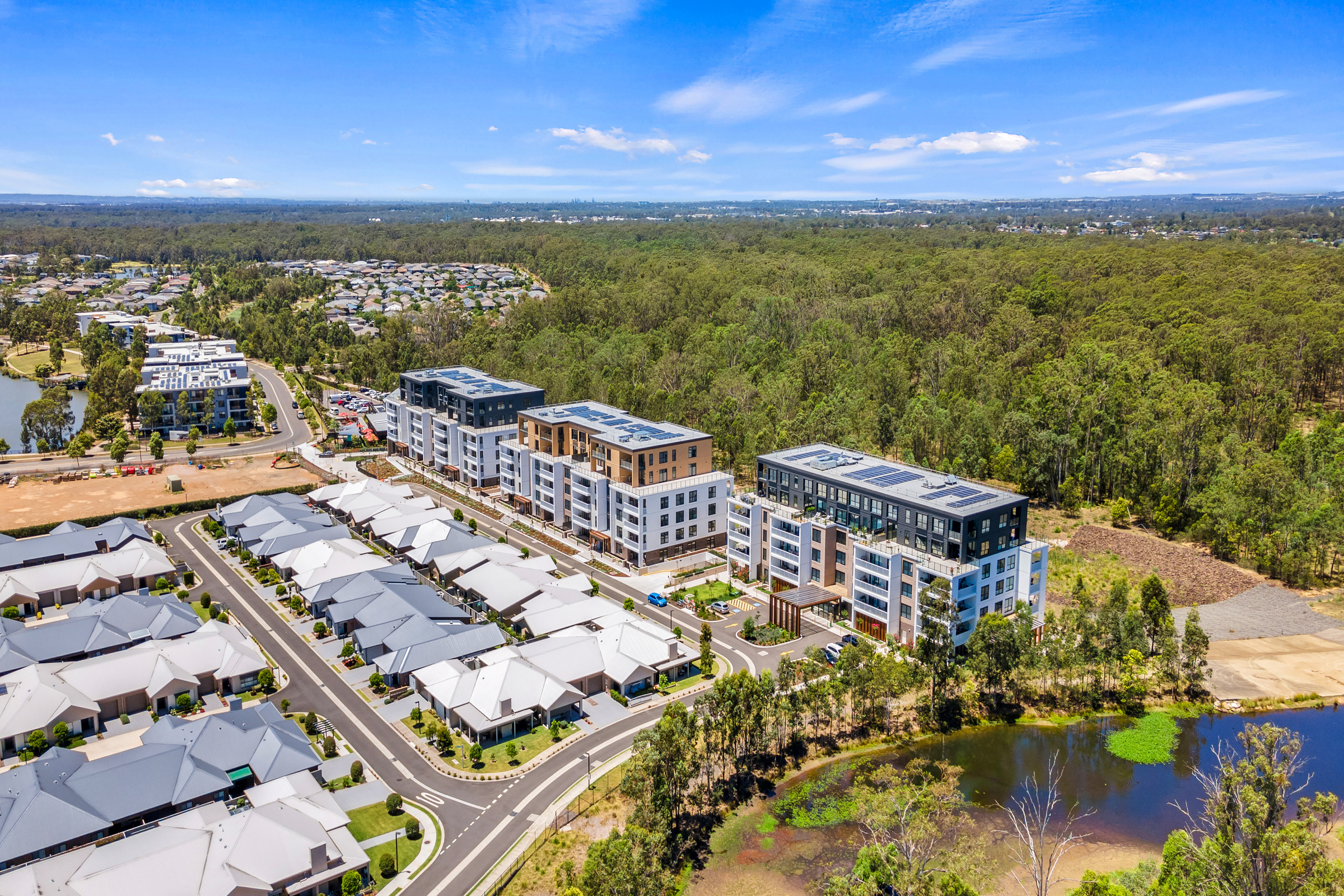 Kingfisher Grove Village Resident walking pet next to villa's 
