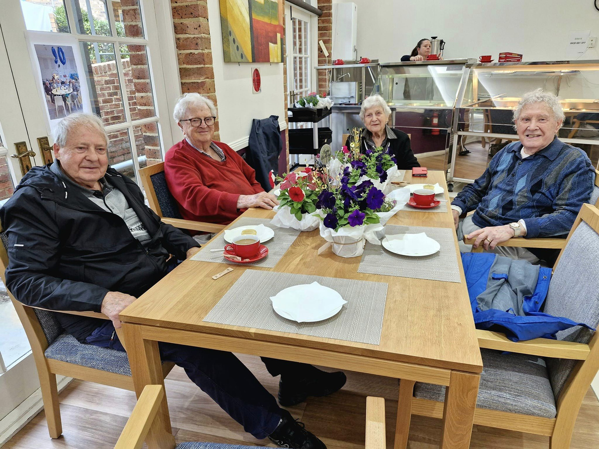 Roy with residents at Brentwood Village celebrating an ‘Over 90s and Still Shining’ afternoon tea