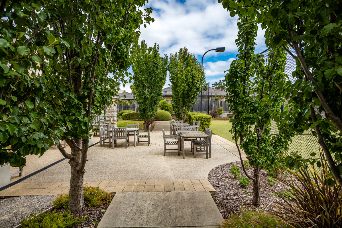 Martha's Point outdoor uncovered courtyard/terrace next to tennis court