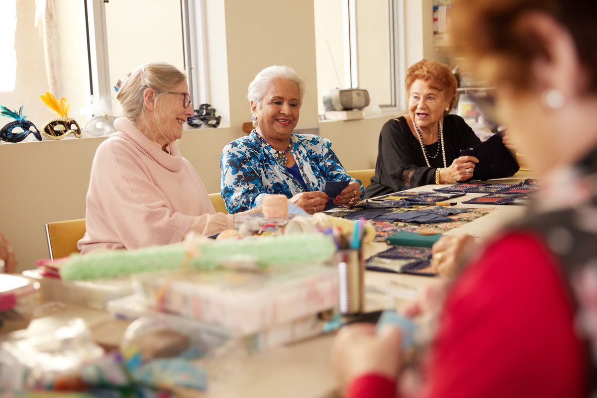 Resident Satya with her arts and crafts group
