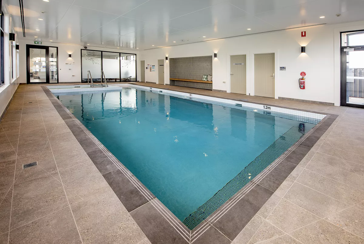 Sherwin Rise good sized indoor swimming pool and spa in light and airy room