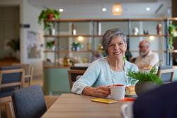 Sherwin Rise resident enjoying morning tea
