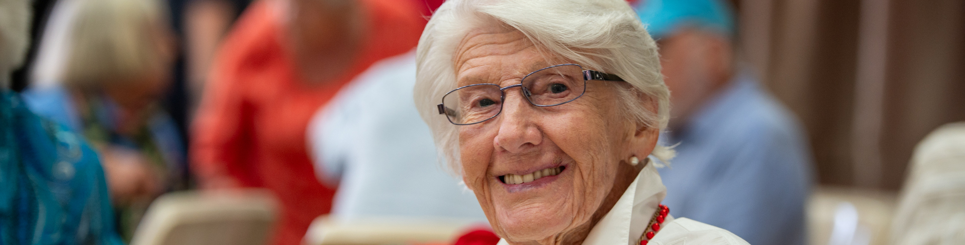 Brentwood Village resident Betty smiling to the camera