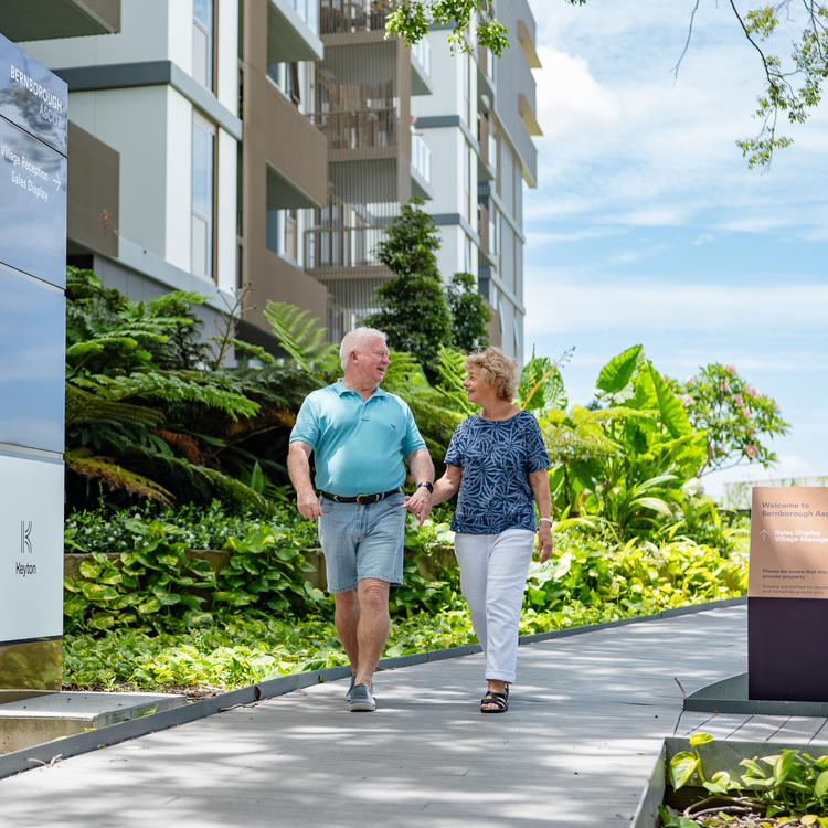 Residents holding hands and walking through Bernborough Ascot