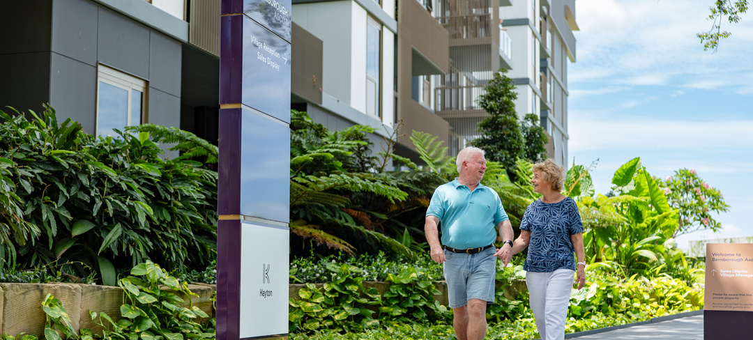 Residents holding hands and walking through Bernborough Ascot