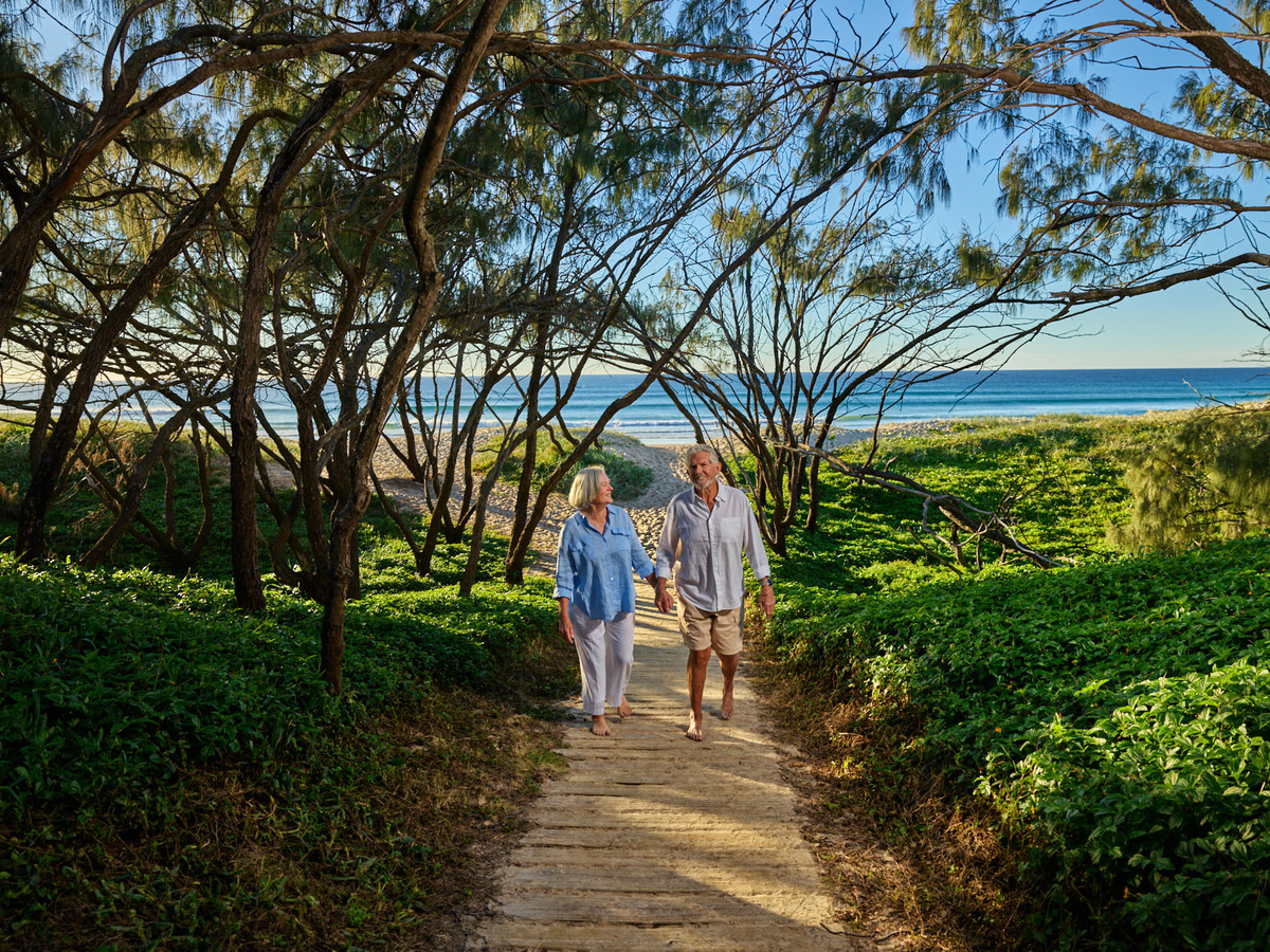 Couple walking on the beach