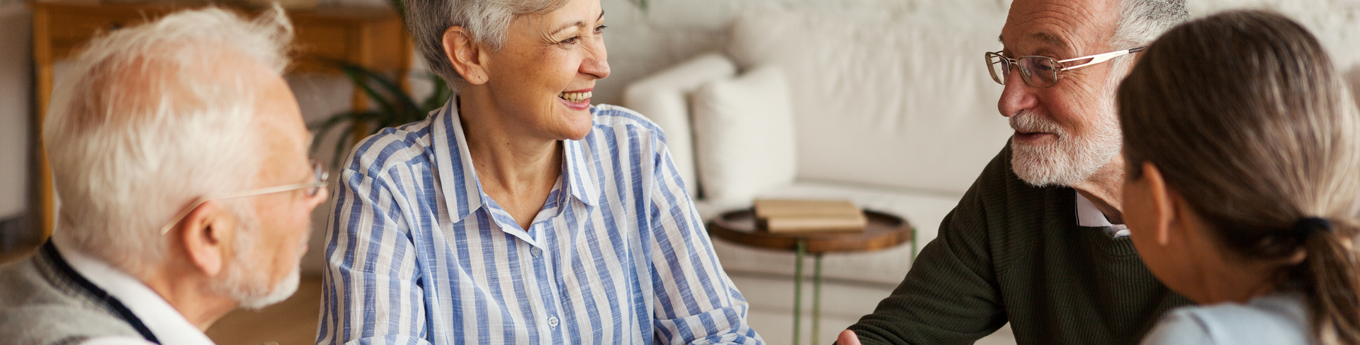 Four retirement village residents sitting around 
