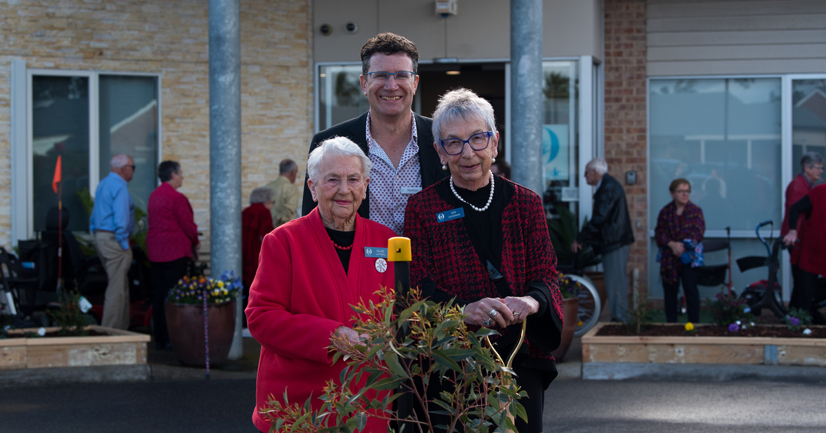 Keyton CEO Nathan Cockerill and other members of the village planting a tree for the 40 year anniversary of the village