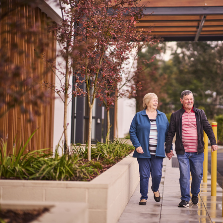 A couple exploring a retirement village together