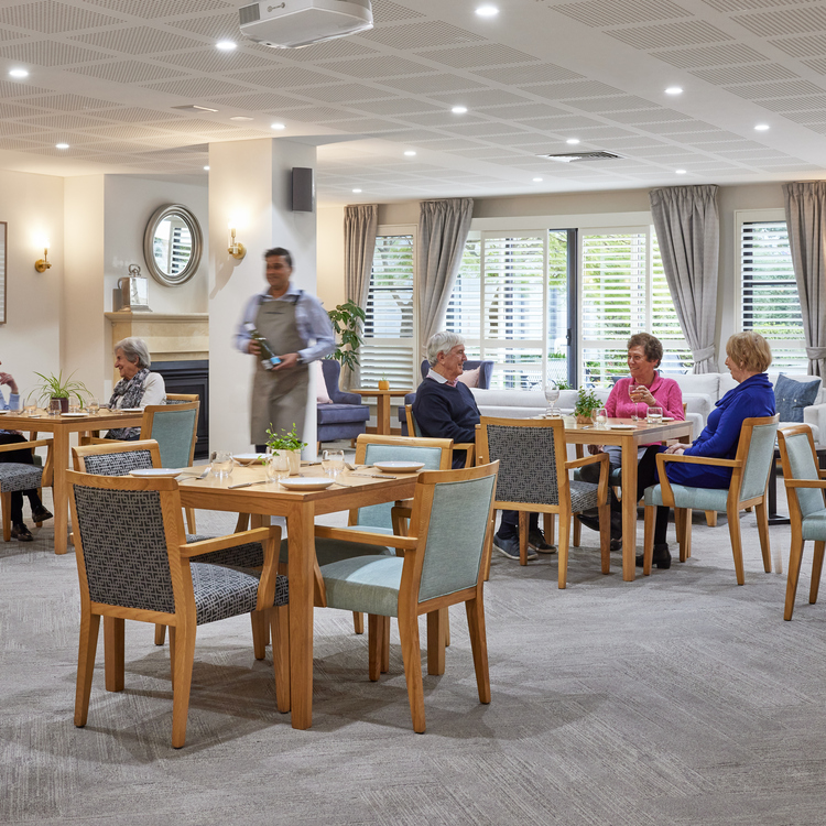Menzies Malvern dining room with people socialising and relaxing