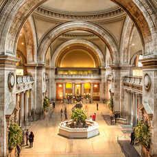 The Met’s Grand Hall is one of many places to visit on a solo trip to New York City.