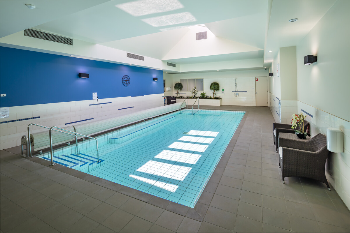 Waverley Country Club good sized indoor swimming pool with poolside seating