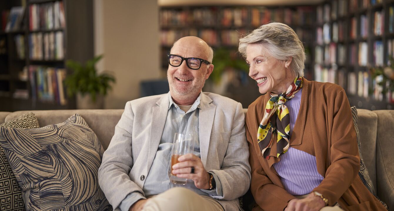 Senior couple learning about service fees