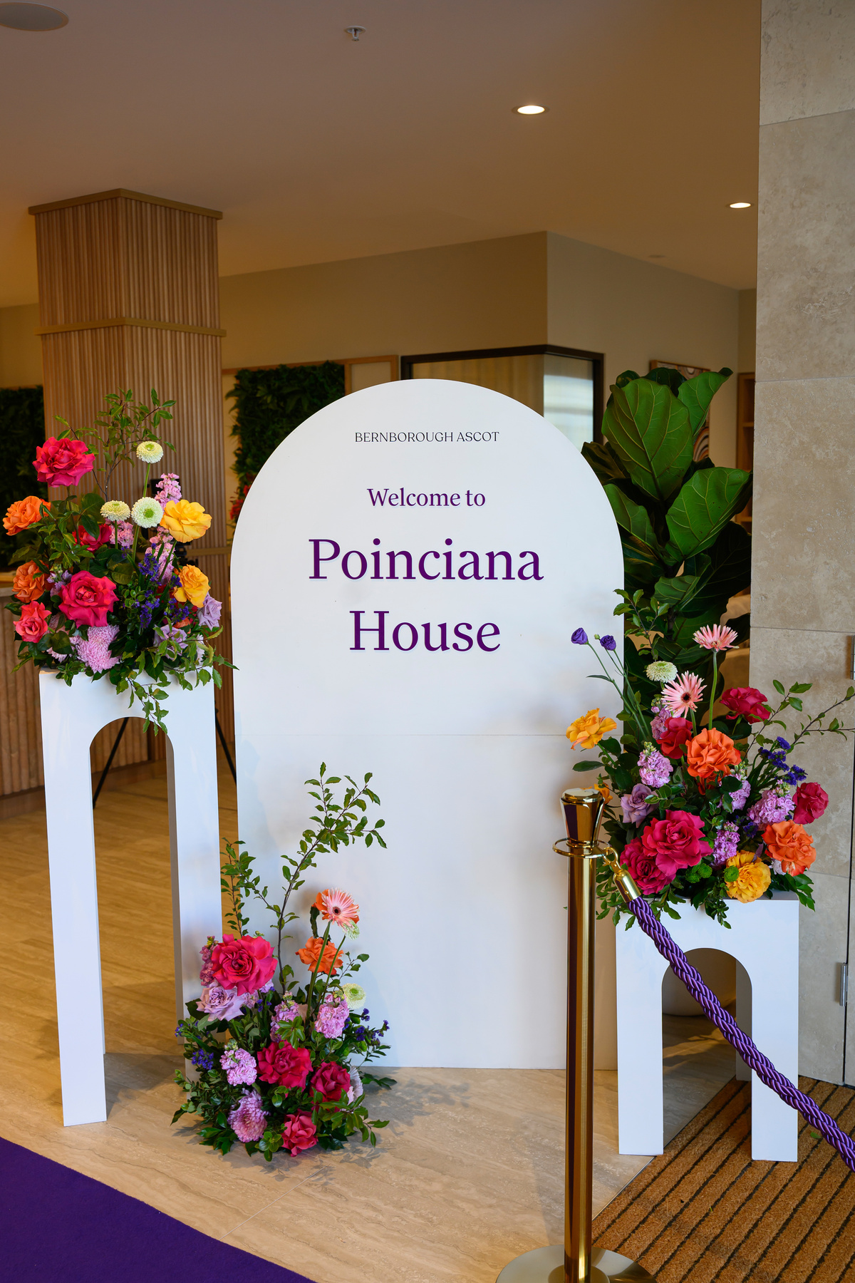 the Poinciana house banner