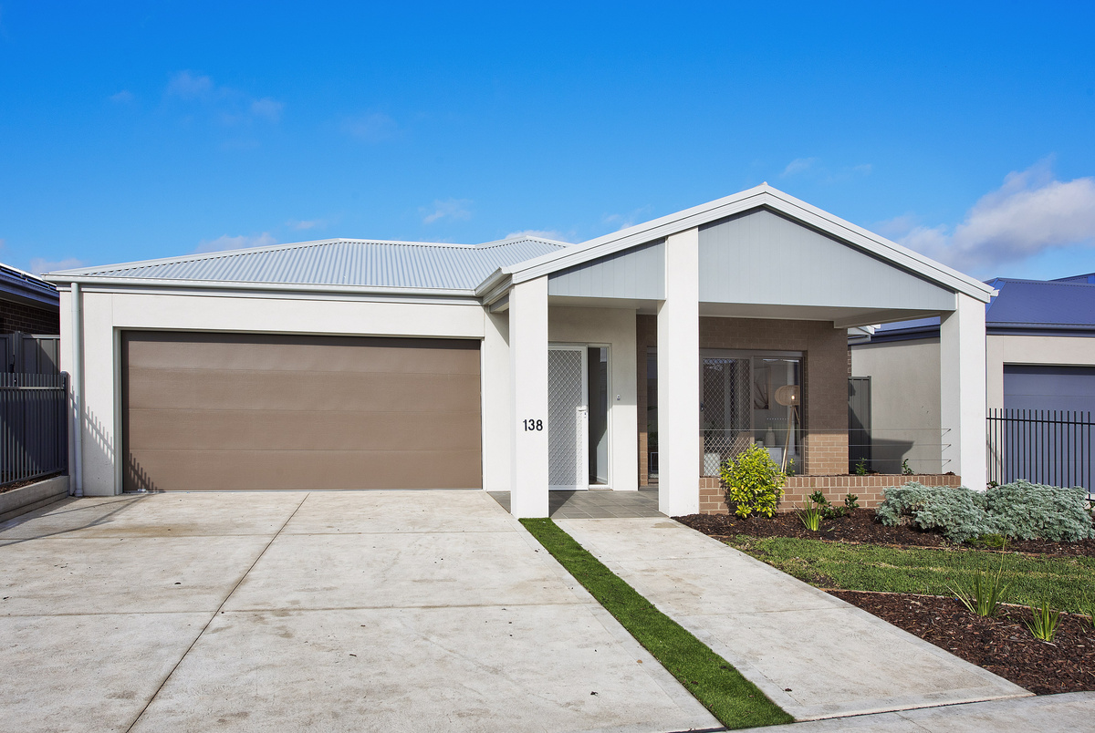 Sherwin Rise village from street with large porch and double garage