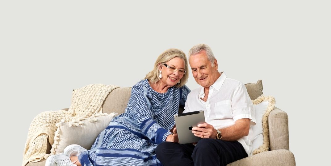 smart technology seniors using technology ipad couple with a tech