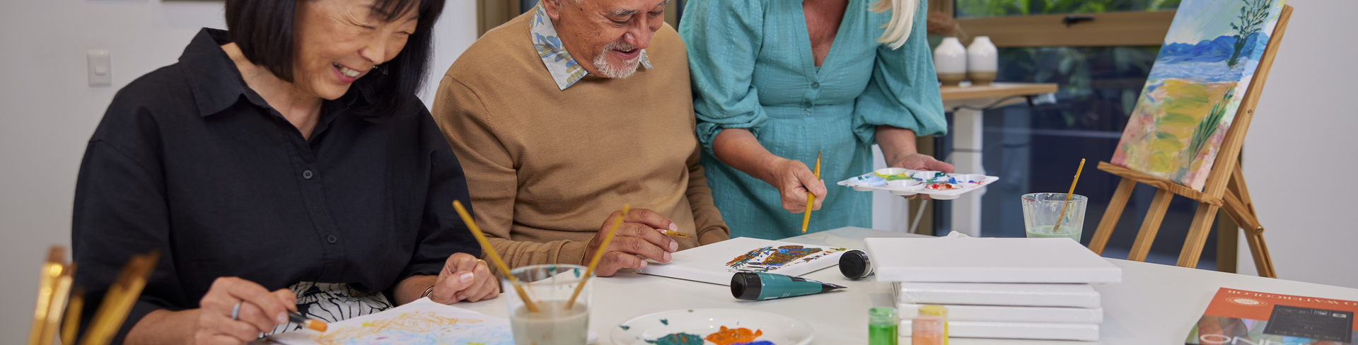 Smiling Residents in an art class