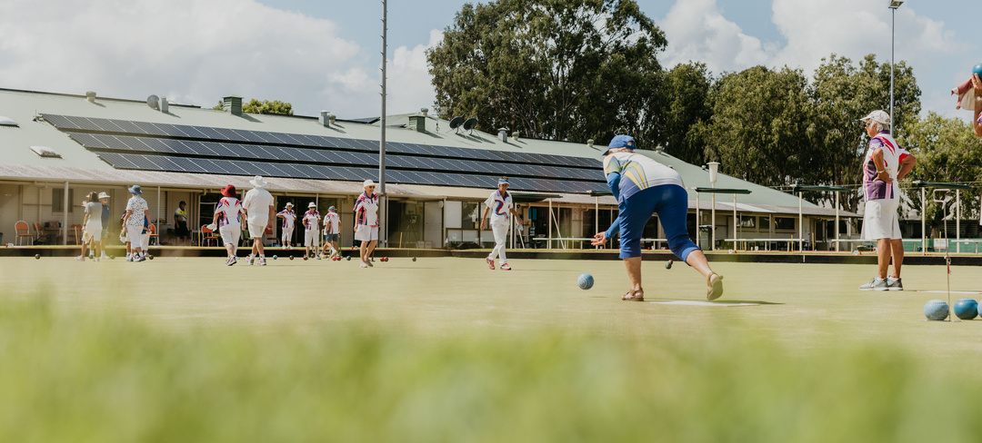 residents playing bowls outdoors 