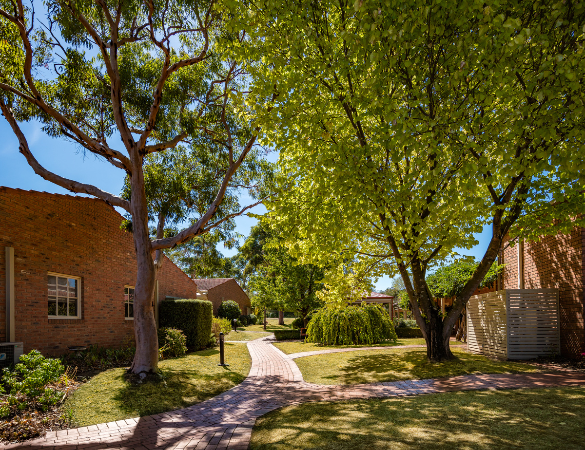 A path in leafy green Fiddlers Green retirement village