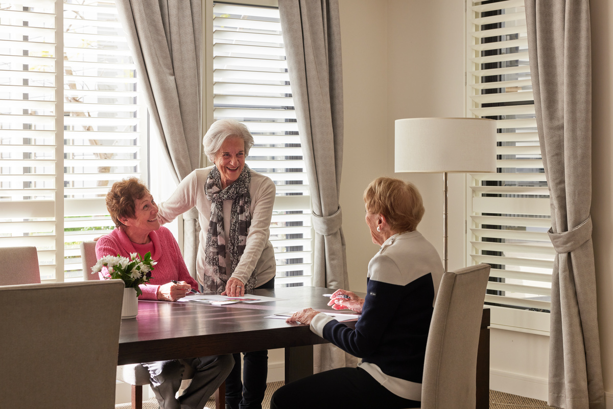 Menzies Malvern group of women socialising at table