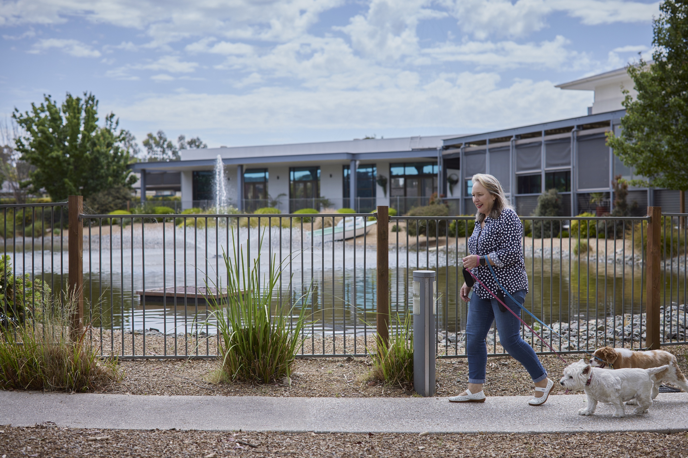Woodlands Park Resident walking dog
