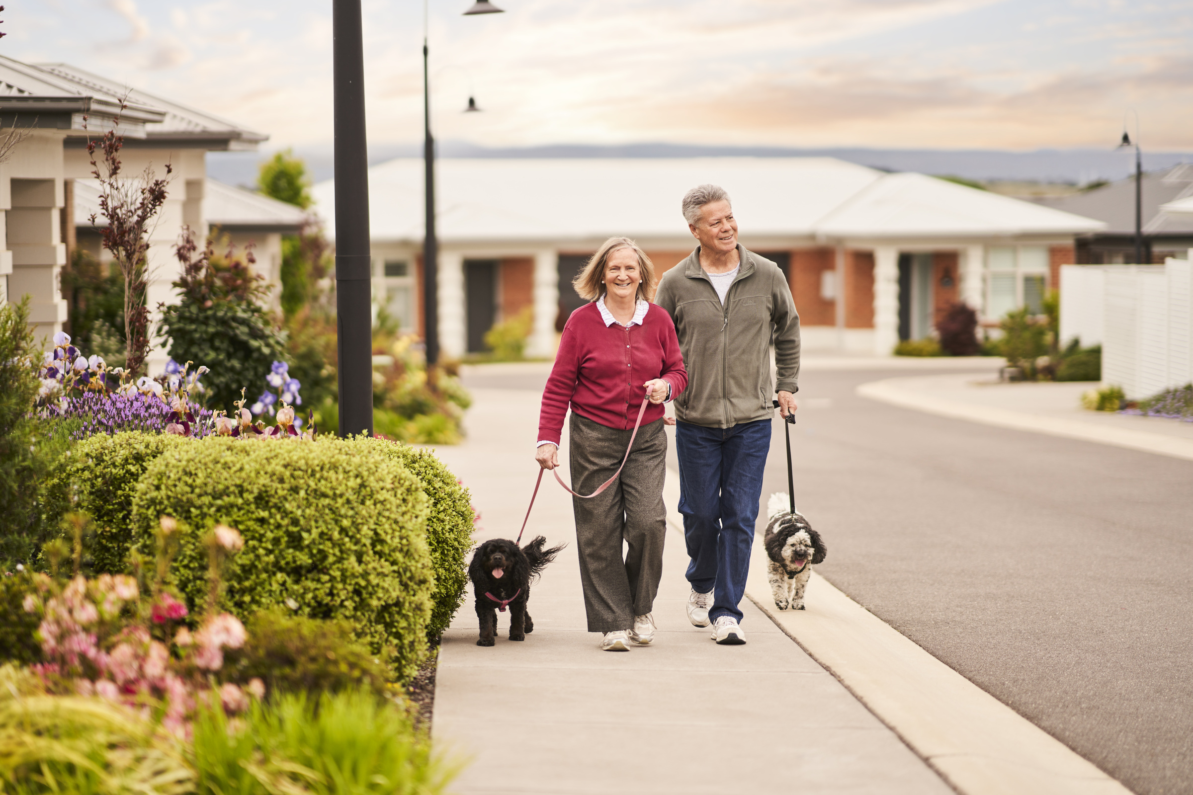 The Aerie at Narrabundah - Residents walking with pet in the village