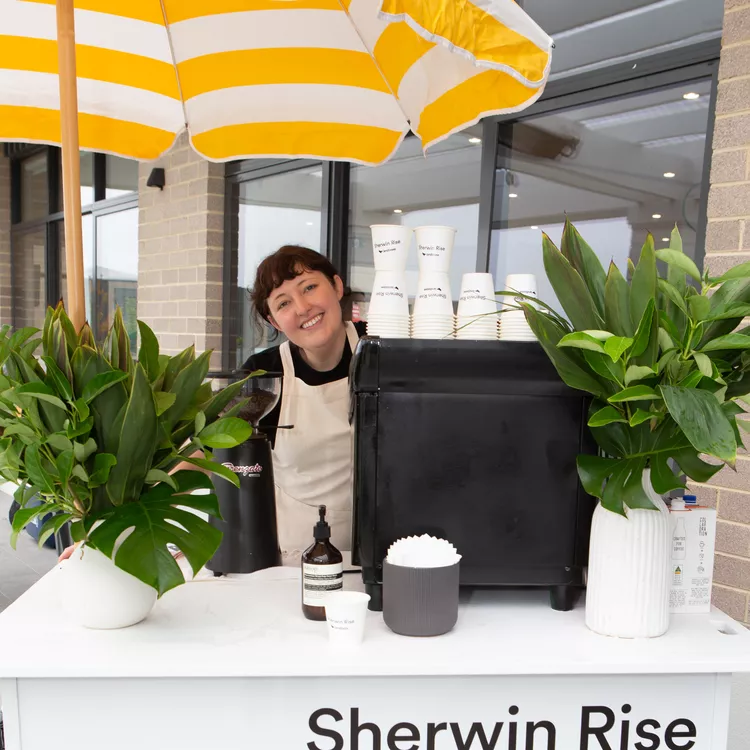 Sherwin Rise friendly barista at outdoor barista cart