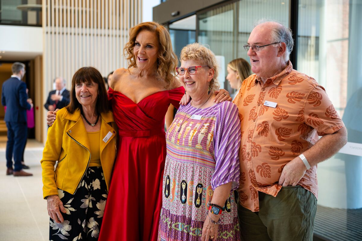 Susanna posing with other residents and Rhonda Burchmore