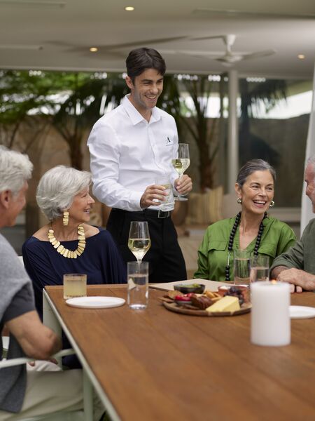 Seniors enjoying lunch together at Ardency
