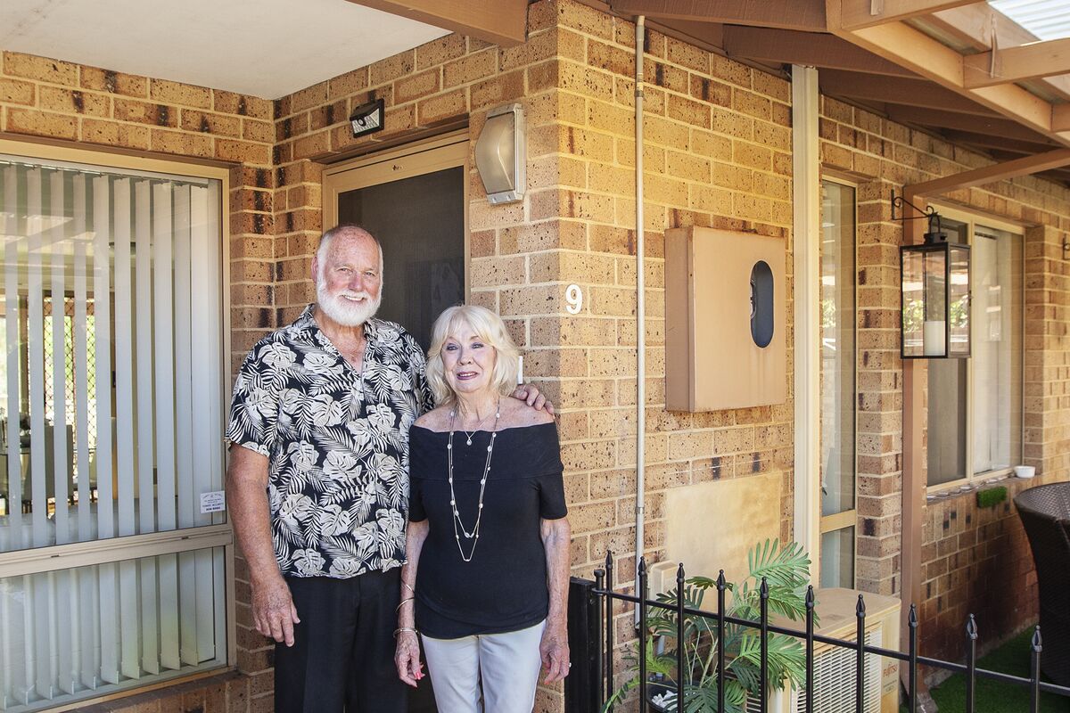 Gaye and Doug in front of their new villa