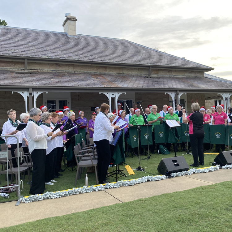 The choir sings at Carols at Closebourne