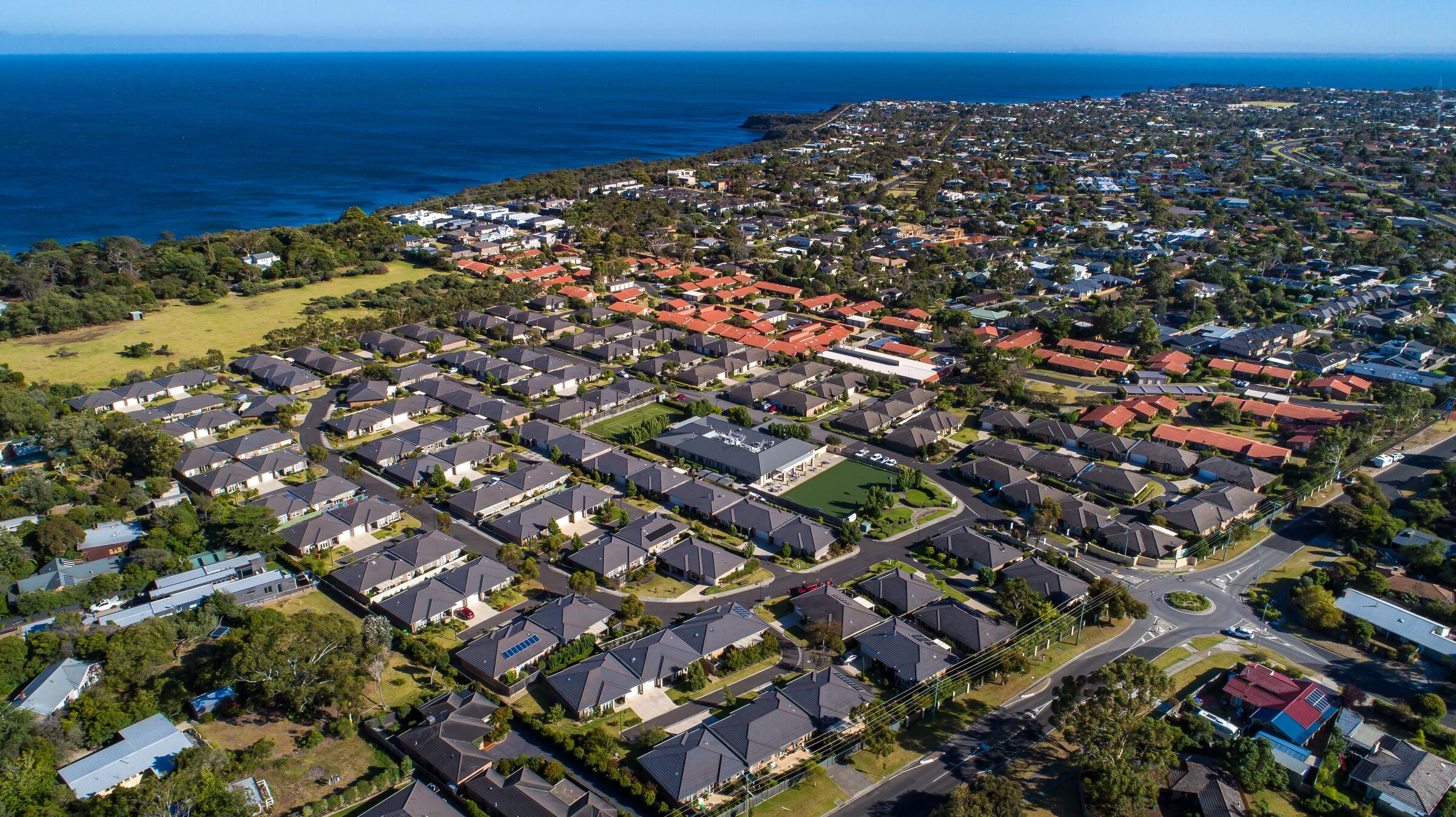 Martha's Point aerial image of outside buildings capturing village and surrounding district