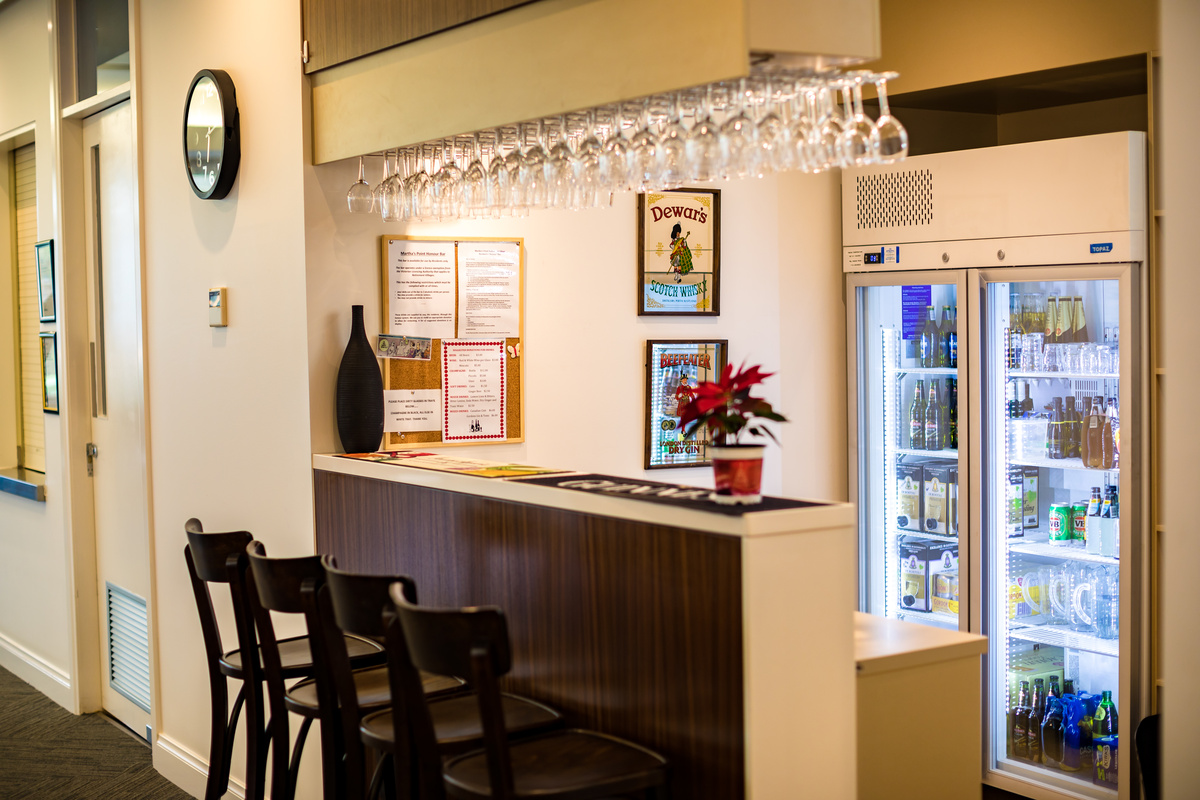 Martha's Point  bar with stocked drinks fridge