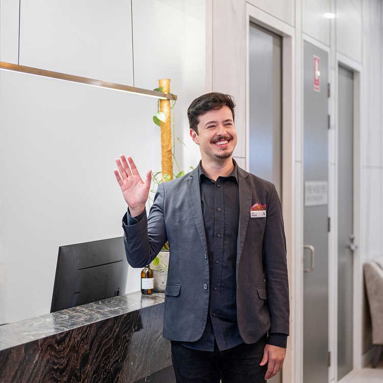 Trebartha concierge waving at guests