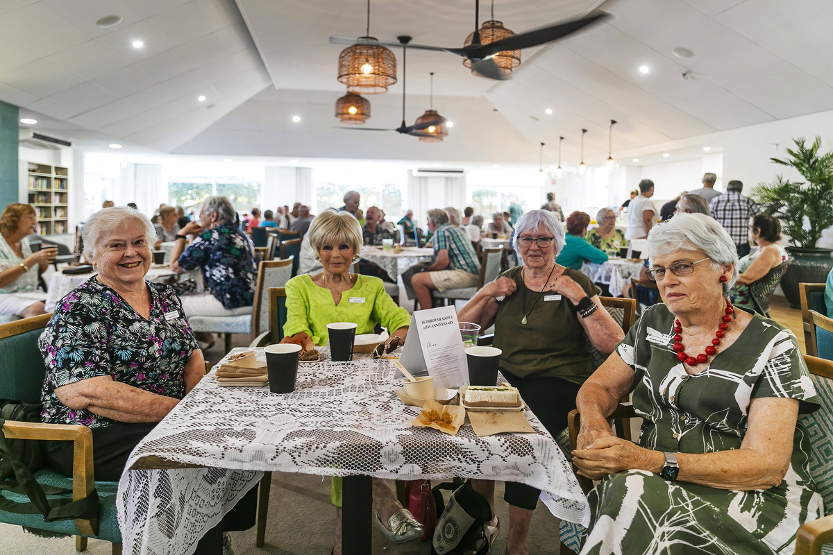 Residents sitting at the community centre where the celebrations was held