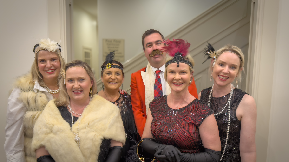 a group of people dressed in vintage clothes