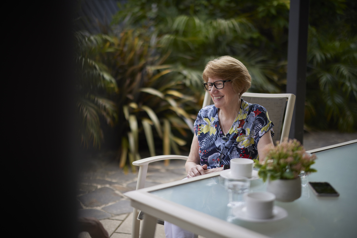 Highvale Village resident having a coffee