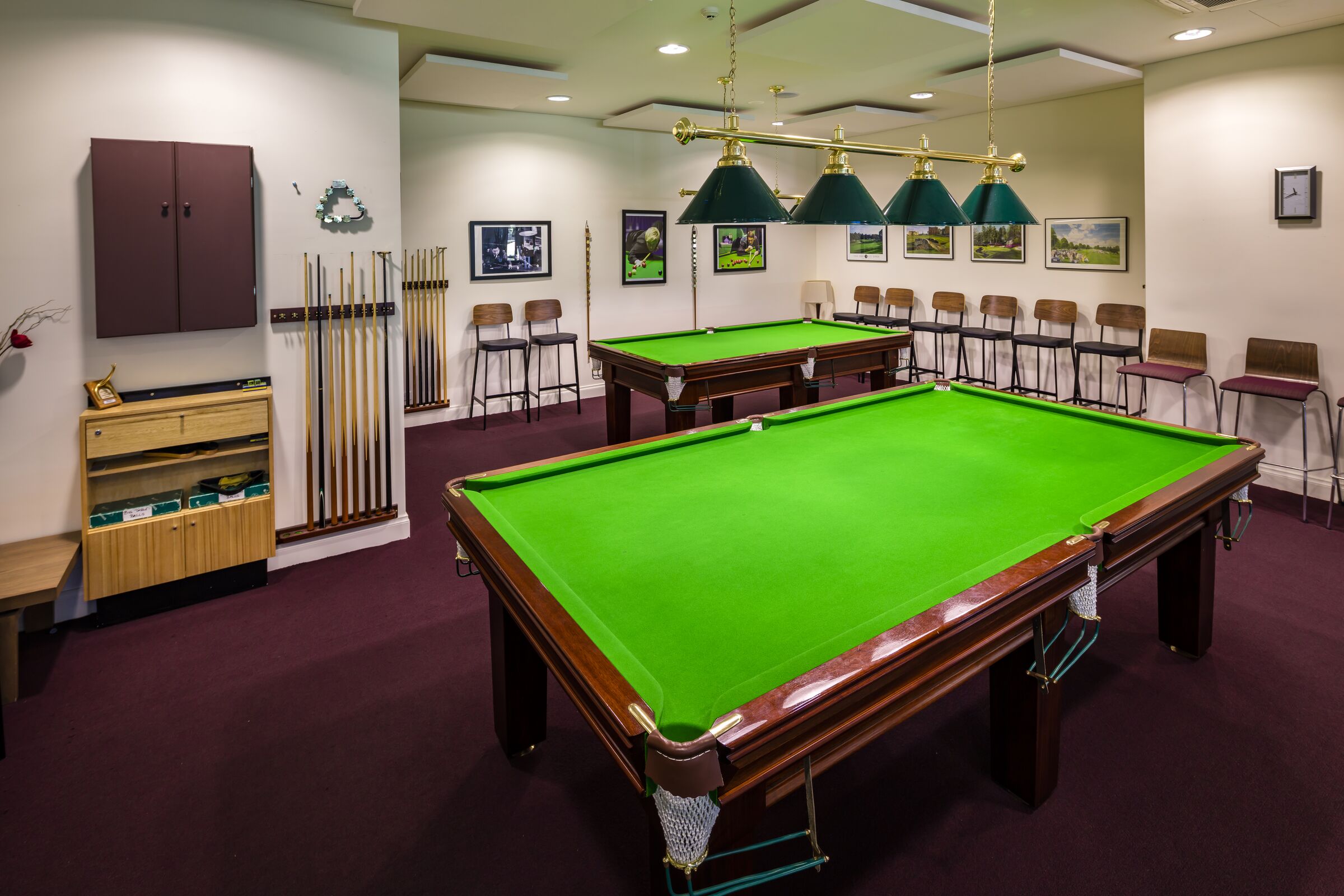 Waterford Park pool room with two pool tables and darts board
