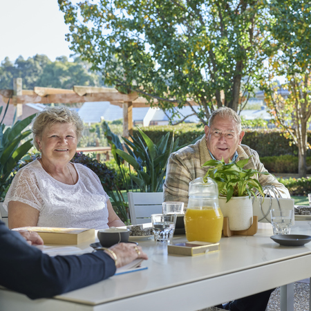 Abervale residents at the village sitting outside in the sunshine
