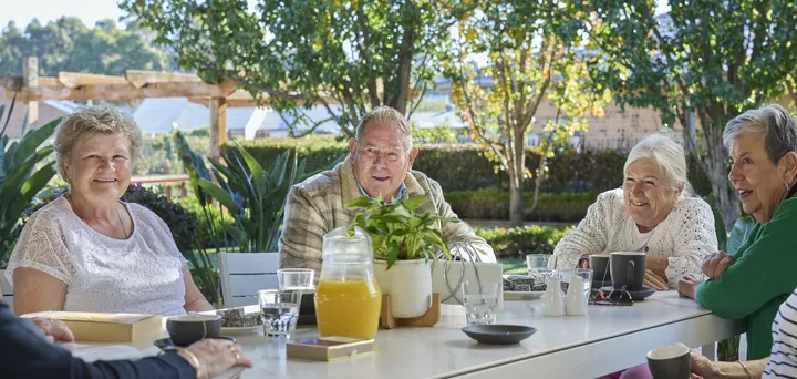 Abervale residents at the village sitting outside in the sunshine