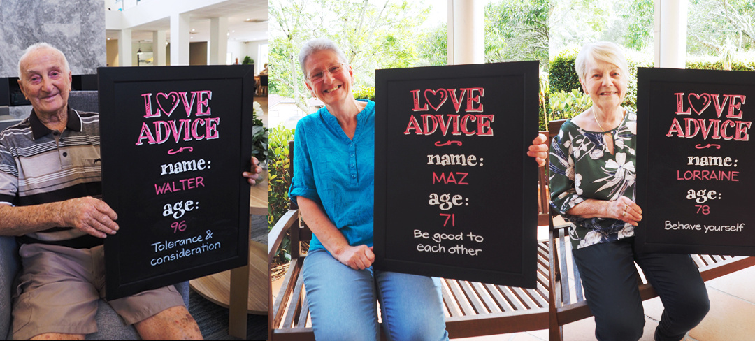 Five residents sitting and holding an A4-sized blackboard each with their name, age and love advice on it.