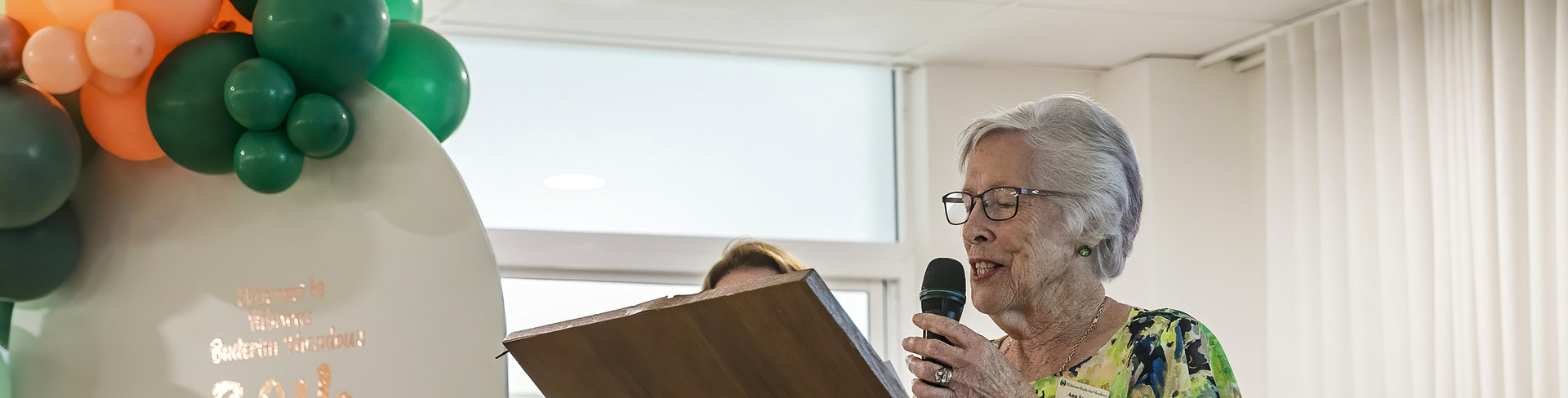  resident making a speech on the day of the anniversary celebration