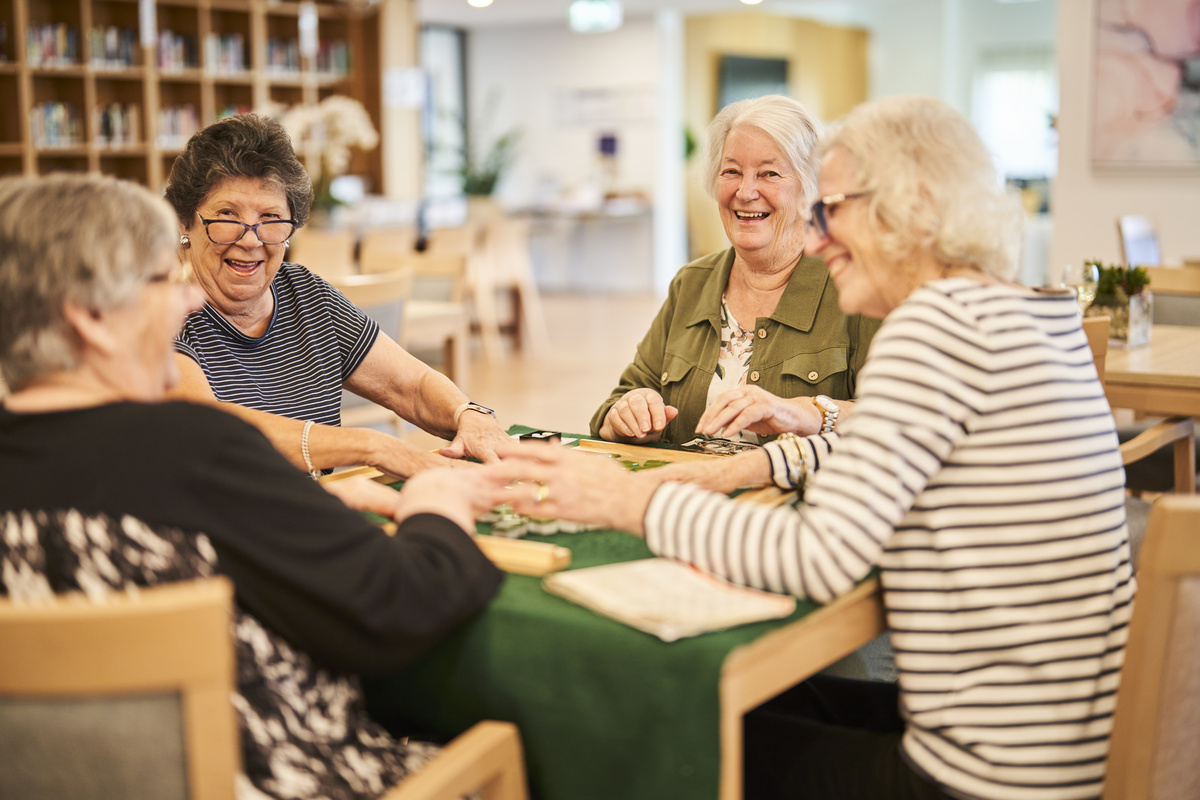 Nelsons Grove residents playing mahjong in the community clubhouse